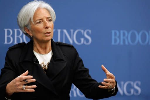 The US and the IMF welcomed China's decision to widen the trading band on the nation's currency, while analysts downplayed Sunday the likelihood of wide swings in the value of the yuan. IMF chief Christine Lagarde (pictured on April 12) described the move on the yuan as an "important step."