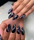 <p>Nature-inspired nails are always a good idea, but if rainbows and blue skies aren't really your vibe, maybe something a little moodier, like thunderstorms are. These little lightning bolts not only look cool, but they also help to <strong>elongate an <a href="https://www.cosmopolitan.com/style-beauty/beauty/g26418551/almond-nails-shape-design/" rel="nofollow noopener" target="_blank" data-ylk="slk:almond nail shape;elm:context_link;itc:0;sec:content-canvas" class="link ">almond nail shape</a></strong> like this one.</p><p><a href="https://www.instagram.com/p/CHf4uYsAJjJ/?utm_source=ig_embed&utm_campaign=loading" rel="nofollow noopener" target="_blank" data-ylk="slk:See the original post on Instagram;elm:context_link;itc:0;sec:content-canvas" class="link ">See the original post on Instagram</a></p>