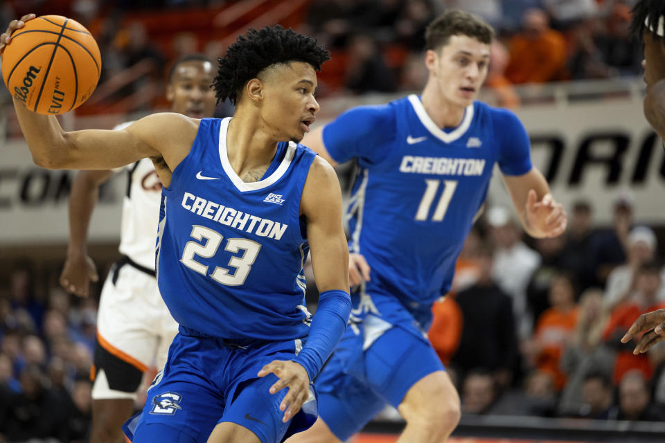Creighton guard Trey Alexander (23) handles the ball in the first half of an NCAA college basketball game against Oklahoma State, Thursday, Nov. 30, 2023, in Stillwater, Okla. (AP Photo/Mitch Alcala)