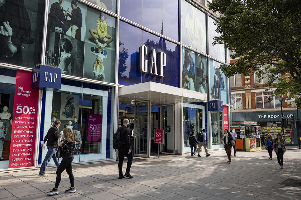 People walk past the Gap flagship Oxford Street store on July 2, 2021 in London, England. - Credit: Getty Images