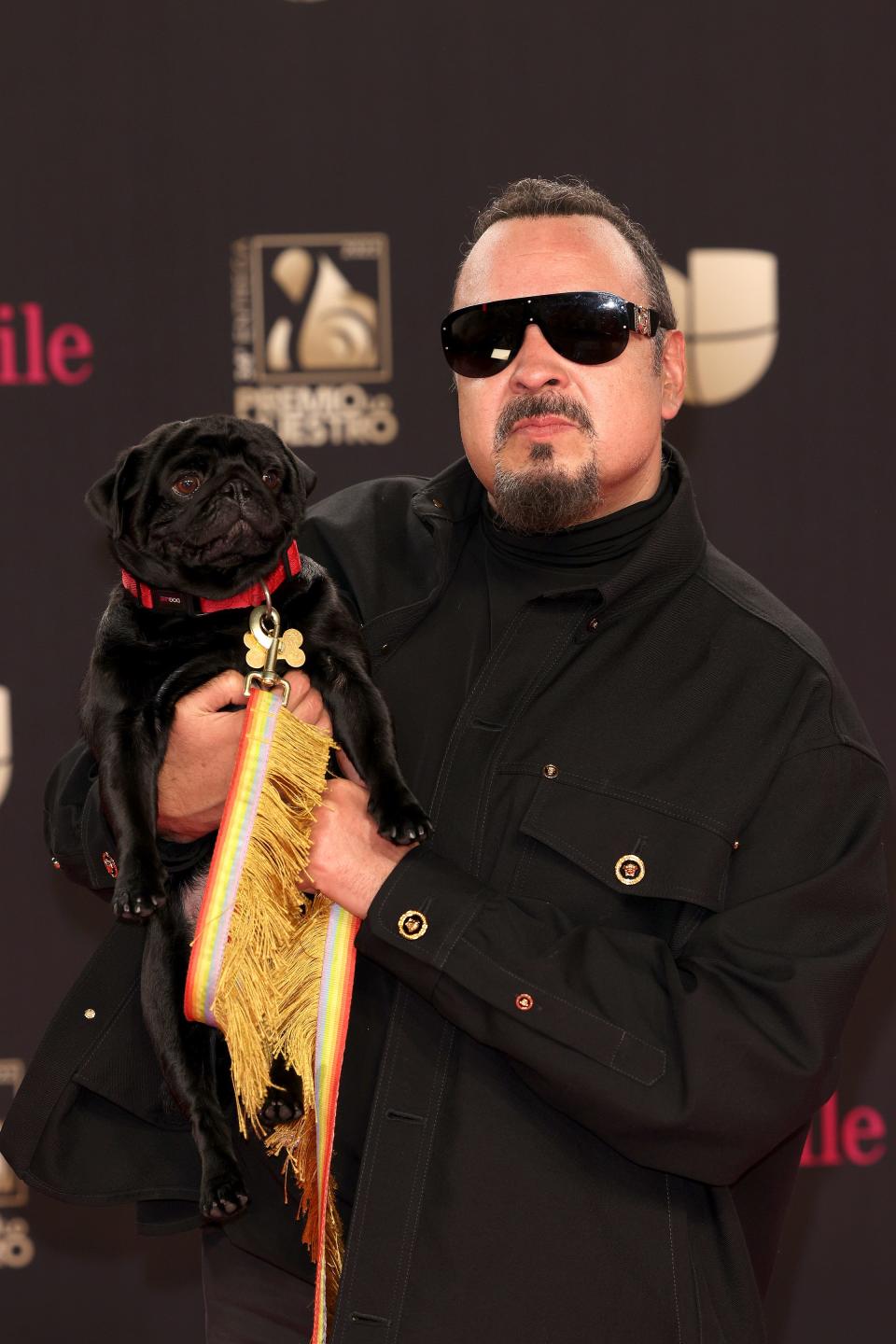 Pepe Aguilar and his dog Gordo El Pug Aguilar attend the 34th annual Premio Lo Nuestro in Miami, Florida.