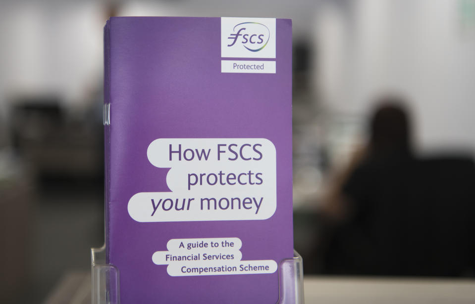 CARDIFF, UNITED KINGDOM - AUGUST 14: A leaflet from the FSCS (financial services compensation scheme) seen in a bank on August 14, 2018 in Cardiff, United Kingdom. (Photo by Matthew Horwood/Getty Images)