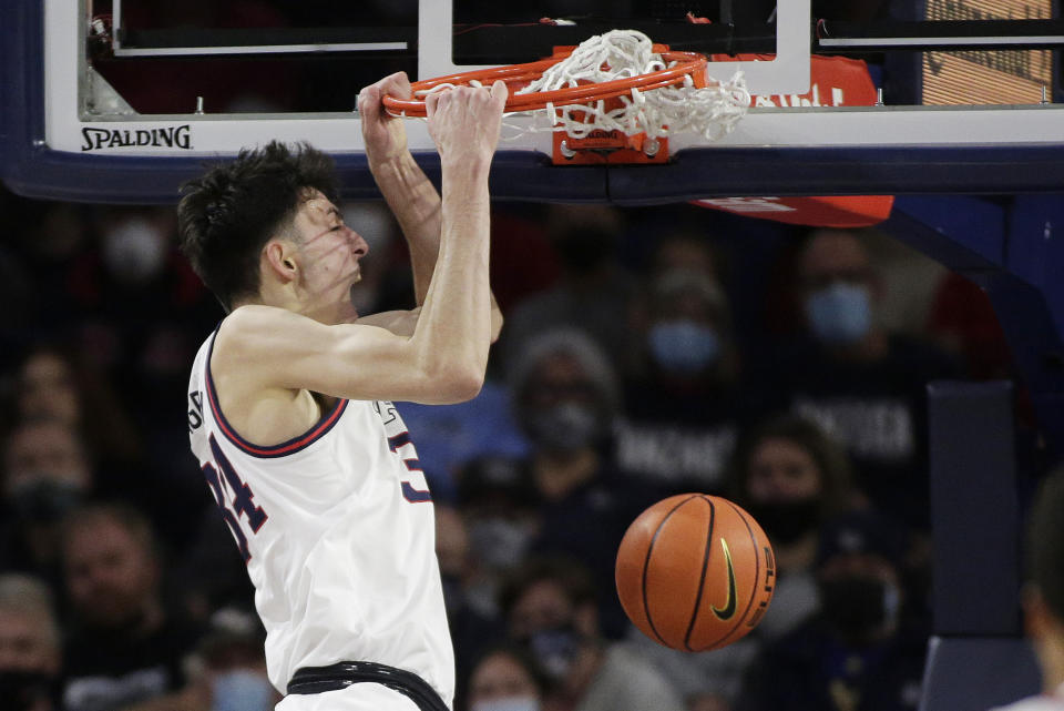 Gonzaga center Chet Holmgren dunks during the first half of the team's NCAA college basketball game against Bellarmine, Friday, Nov. 19, 2021, in Spokane, Wash. (AP Photo/Young Kwak)