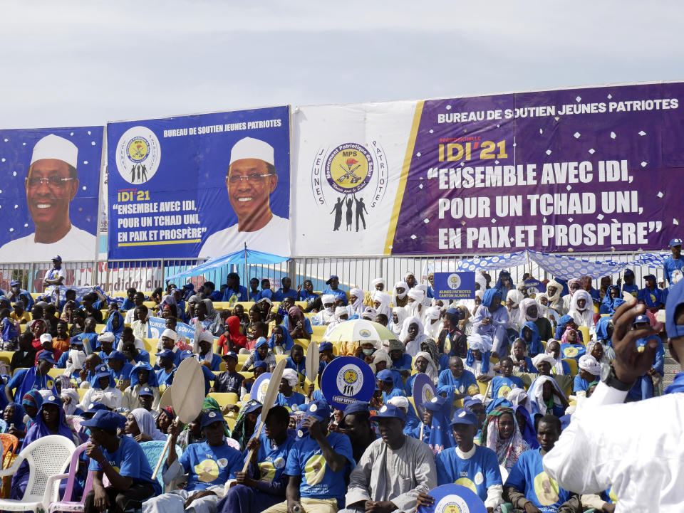 Supporters of Chadian President Idriss Deby Itno gather for a rally in N'djamena, Chad, Friday April 9, 2021. Deby is seeking to extend his three-decade long rule, running for a sixth time in this oil-producing Central African nation that is home to nearly half a million refugees and also plays a prominent role in the fight against Islamic extremism in the Sahel. (AP Photo/Joel Kouam)