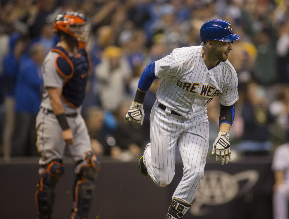 Milwaukee Brewers' Ryan Braun hits a two-run RBI double against the Detroit Tigers during the seventh inning of an baseball game Sunday, Sept. 30, 2018, in Milwaukee. (AP Photo/Darren Hauck)