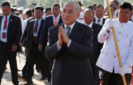 Cambodia's King Norodom Sihamoni greets people as he attends a royal ploughing ceremony in Takeo province, Cambodia, May 22, 2019. REUTERS/Stringer