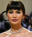 <p> This colour of eyeshadow looks nothing short of incredible on Gemma Chan, who paired the warm green shade with darker emerald green liner, a contrasting magenta lip and super glowy skin for her look on the 2021 Met Gala red carpet. </p>