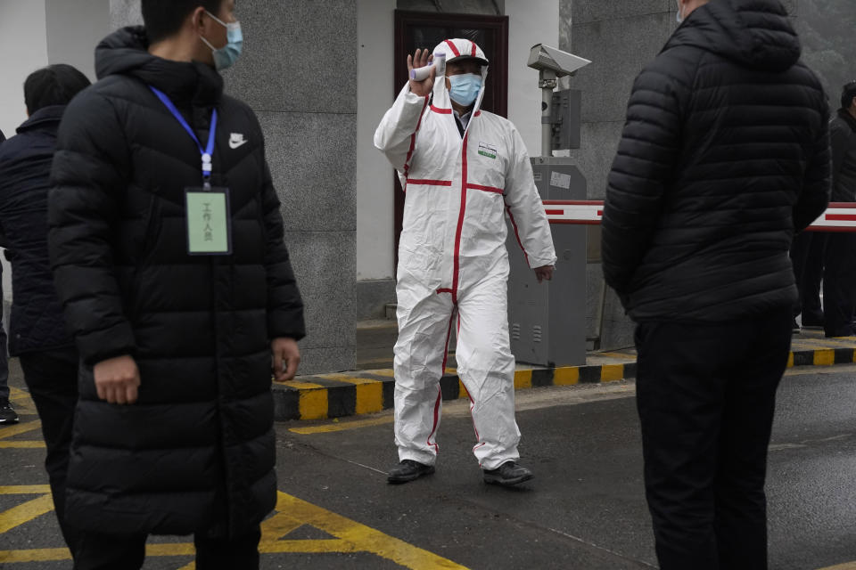 Marion Koopmans of a World Health Organization team arrives at the Hubei Center for Disease Control and Prevention in Wuhan in central China's Hubei province Monday, Feb. 1, 2021. The WHO mission team investigating the origins of the coronavirus pandemic in Wuhan. (AP Photo/Ng Han Guan)