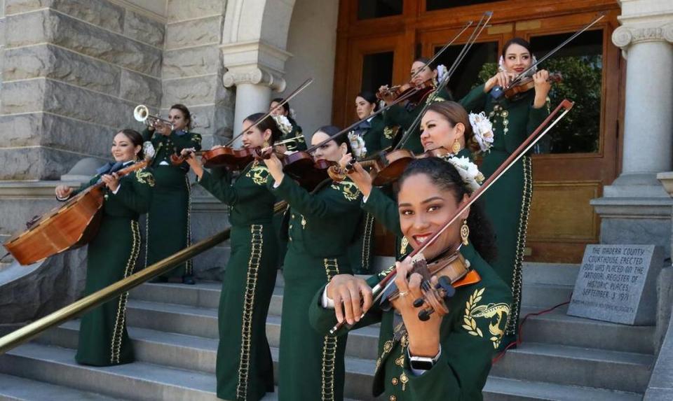 Mariachi Femenil Estrella de México performs in front of the Madera County Courthouse on May 30, 2022.