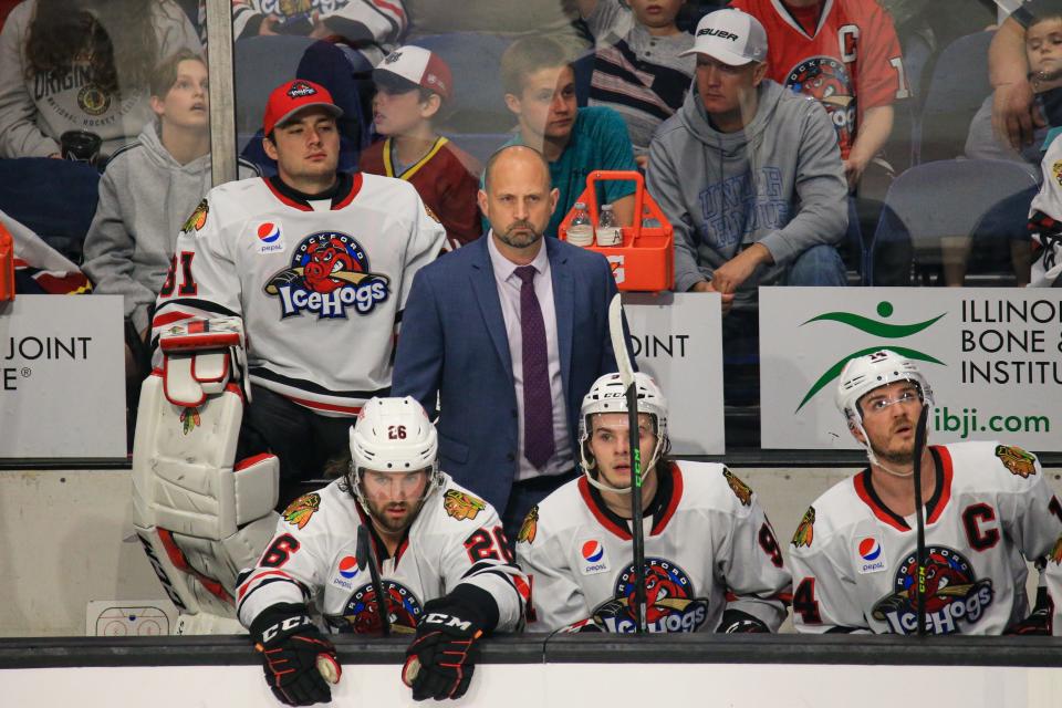 Anders Sorensen, middle in the tie, was just hired to be the Rockford IceHogs official head coach after spending most of last season as the interim head coach.