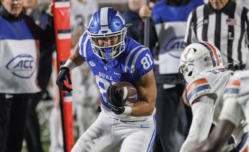 Duke's Nicky Dalmolin (81) carries the ball after a reception during the first half of the team's NCAA college football game against Virginia in Durham, N.C., Saturday, Oct. 1, 2022. (AP Photo/Ben McKeown)