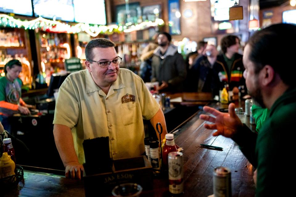 Co-owner Bob Roberts, left, talks with Alberto Ruiz of Royal Oak at McShane's Irish Pub in Detroit on March. 10, 2024.