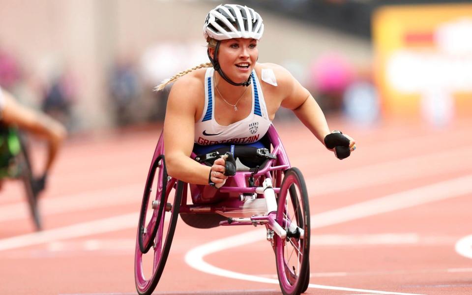 Sammi Kinghorn celebrates winning the Women's 100m T53 Final - Credit: PA