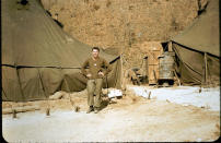  <p class="MsoNormal"><span>A soldier in front of a stores tent at A Echelon, circa 1952. Photo courtesy of <a href="http://www.thememoryproject.com/stories/Korea/" rel="nofollow noopener" target="_blank" data-ylk="slk:Ron Carruth;elm:context_link;itc:0;sec:content-canvas" class="link ">Ron Carruth</a> and <a href="http://www.thememoryproject.com" rel="nofollow noopener" target="_blank" data-ylk="slk:Historica-Dominion Institute;elm:context_link;itc:0;sec:content-canvas" class="link ">Historica-Dominion Institute</a>.</span></p> 