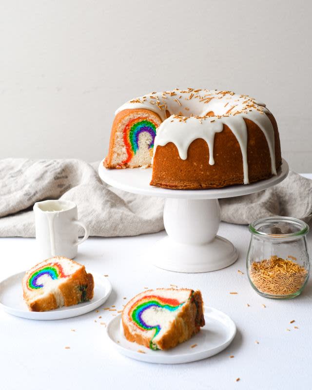 <p>A dreamy fluffy white cake with a nostalgic flavor of ‘birthday’ baked into a bundt. Slice it open and Oooh! A perfect rainbow centers every slice.</p><p><strong>Get the recipe: <a href="https://www.buttermilkbysam.com/blog/2019/3/1/hidden-rainbow-cake" rel="nofollow noopener" target="_blank" data-ylk="slk:Hidden Rainbow Cake;elm:context_link;itc:0;sec:content-canvas" class="link rapid-noclick-resp"><em>Hidden Rainbow Cake</em></a></strong></p>