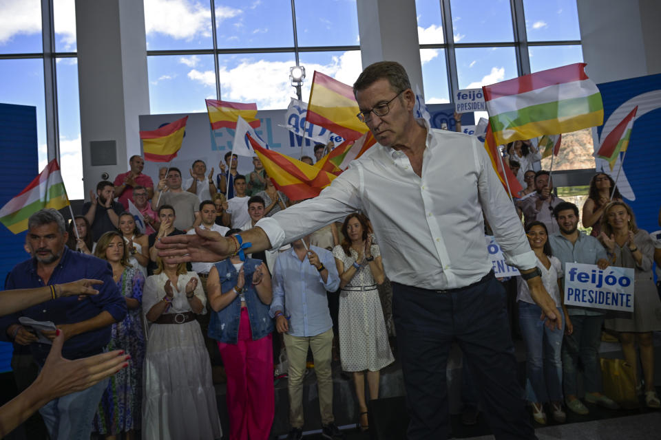 Popular Party candidate Nunez Feijoo cheers supporters during a campaign rally in Logrono, northern Spain, Saturday, July 15, 2023. The conservative Popular Party candidate for Sunday's general election is mostly unknown outside Spain, but he has been the country's most solid regional leader so far this century and has never lost an election. (AP Photo/Alvaro Barrientos)