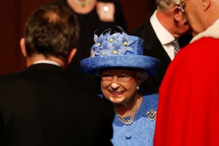 Britain's Queen Elizabeth smiles as she arrives to attend the State Opening of Parliament in central London, Britain June 21, 2017. REUTERS/Adrian Dennis/Pool