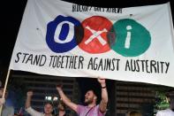 'No' supporters celebrate their victory outside the parliament in Athens on July 5, 2015