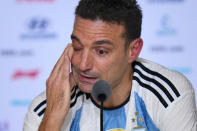 Argentina's head coach Lionel Scaloni gets emotional during a press conference at the end of World Cup final soccer match between Argentina and France at the Lusail Stadium in Lusail, Qatar, Sunday, Dec. 18, 2022. Argentina won 4-2 in a penalty shootout after the match ended tied 3-3. (AP Photo/Hassan Ammar)