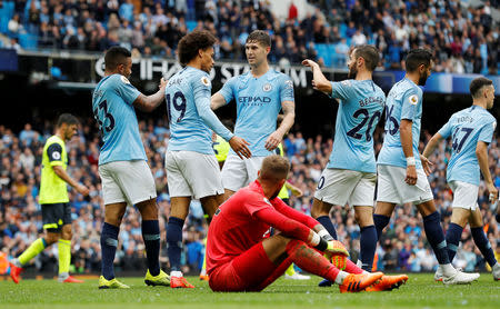 Soccer Football - Premier League - Manchester City v Huddersfield Town - Etihad Stadium, Manchester, Britain - August 19, 2018 Manchester City's Leroy Sane celebrates scoring their sixth goal with team mates REUTERS/Darren Staples