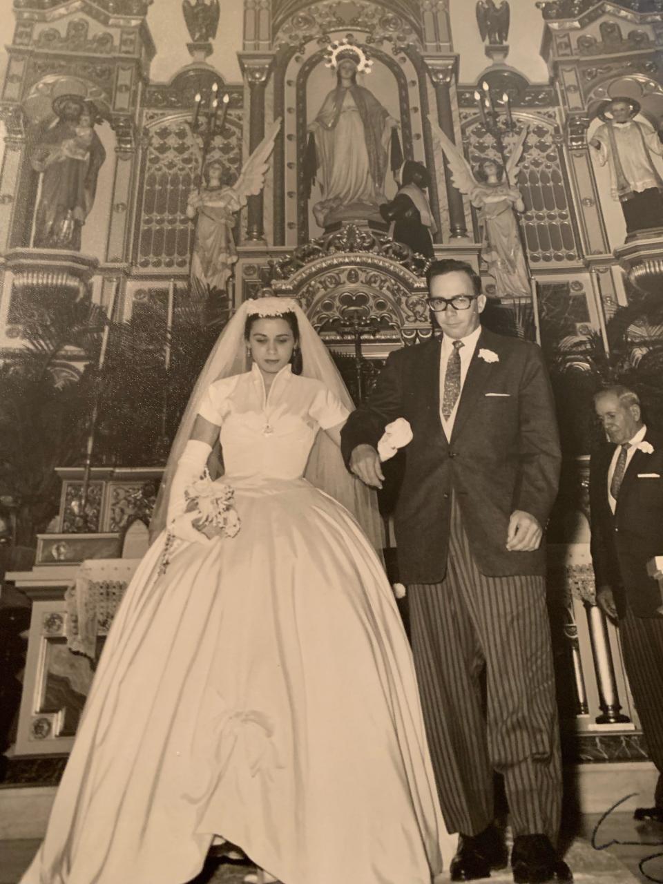 Chris Schlak's grandparents, Nereida and Tomás Rodriguez, getting married in 1958 at Our Lady of Miraculous Medal Catholic Church in Havana, Cuba.