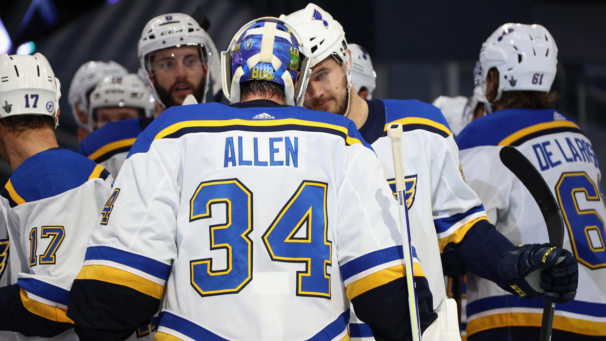 EDMONTON, ALBERTA - AUGUST 17: Goaltender Jake Allen #34 of the St. Louis Blues is congratulated by Mackenzie MacEachern #28 after their 3-1 win against the Vancouver Canucks in Game Four of the Western Conference First Round of the 2020 NHL Stanley Cup Playoff between the St Louis Blues and the Vancouver Canucks at Rogers Place on August 17, 2020 in Edmonton, Alberta. (Photo by Dave Sandford/NHLI via Getty Images)