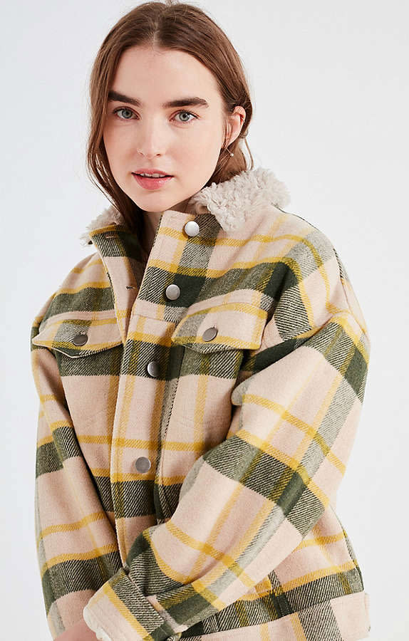 Green and yellow plaid coat.