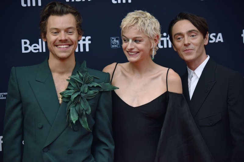 From left to right, Harry Styles, Emma Corrin and David Dawson attend the world premiere of "My Policeman" at the Princess of Wales Theatre during the Toronto International Film Festival in 2022. Photo by Chris Chew/UPI