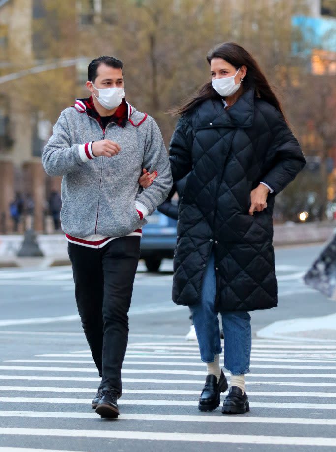 A very happy Katie Holmes is all smiles with her boyfriend Emilio Vitolo Jr. during a romantic stroll in Manhattan's Soho neighborhood. 22 Jan 2021 Pictured: Katie Holmes and Emilio Vitolo Jr. Photo credit: LRNYC / MEGA TheMegaAgency.com +1 888 505 6342 (Mega Agency TagID: MEGA728438_002.jpg) [Photo via Mega Agency]