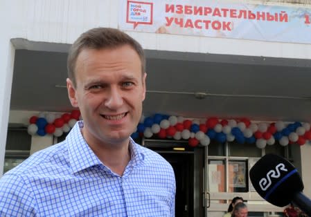 Russian opposition leader Navalny visits a polling station during a local election in Moscow