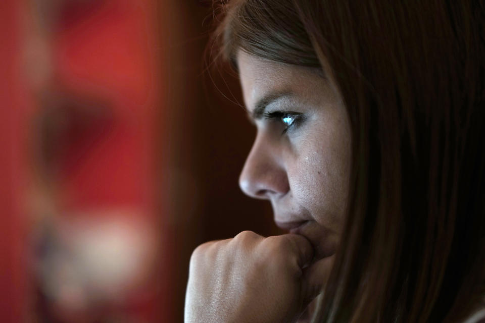 Andreia Sampaio sits at her computer as she works from home, in Lisbon, Friday, Nov. 26, 2021. Portugal’s new law on working from home has grabbed attention around the world for the way it protects staff. Under the new rules, companies can’t attempt to contact their employees outside working hours. They must also help staff pay for their home gas, electric and internet bills. And bosses are forbidden from using digital software to track what their teleworkers are doing. There’s just one problem: the law might not work. (AP Photo/Armando Franca)