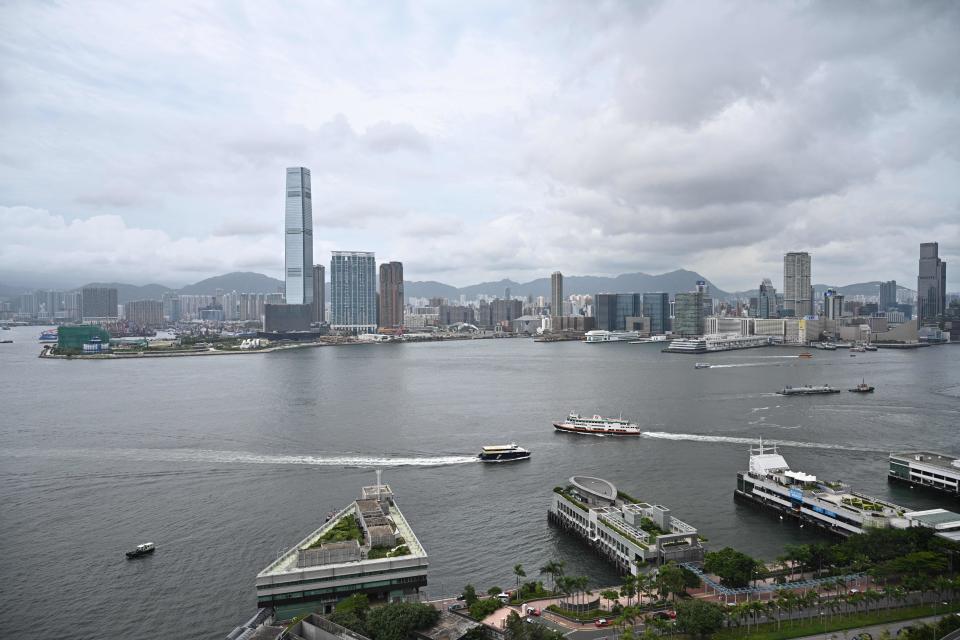 This general view shows the outlying island ferry piers (foreground) along the Hong Kong island side of Victoria Harbour (C) in the Central district and the skyline of Kowloon (top) on July 9, 2020. (Photo: ANTHONY WALLACE/AFP via Getty Images)