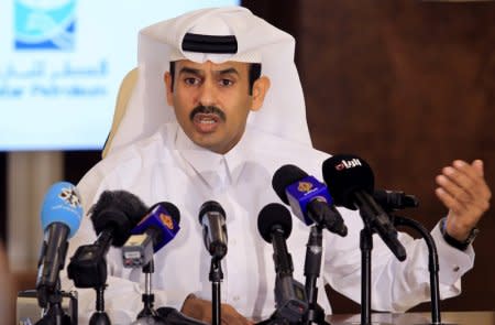 FILE PHOTO: Saad al-Kaabi, chief executive of Qatar Petroleum, gestures as he speaks to reporters in Doha, Qatar, July 4, 2017. REUTERS/Naseem Zeitoon/File Photo