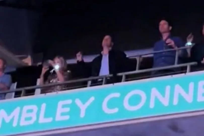 Man dancing at Taylor Swift concert