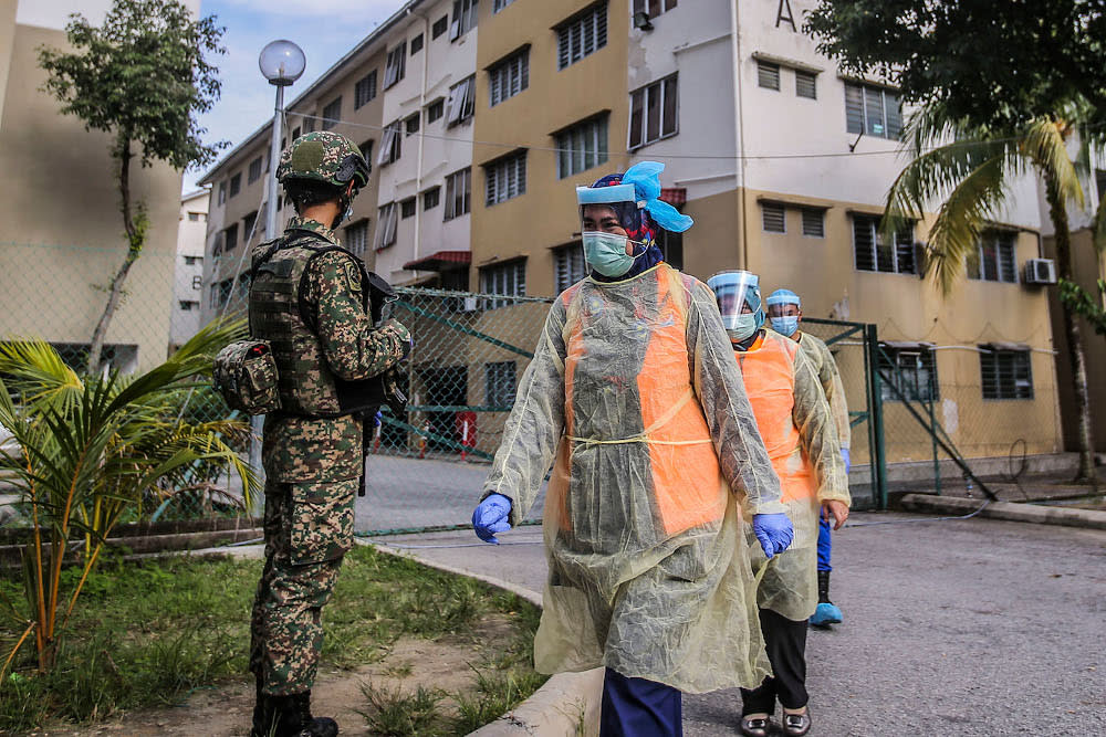 Armed Forces personnel and healthcare workers are pictured at the Tropicana Golf and Country Resort’s hostel in Petaling Jaya October 12, 2020. — Picture by Ahmad Zamzahuri