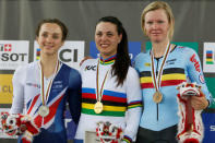 Cycling - UCI Track World Championships - Women's Scratch Race, Final - Hong Kong, China - 12/4/17 - Britain's Elinor Barker, Italy's Rachele Barbieri and Belgium's Jolien D'Hoore celebrate with their medals on the podium. REUTERS/Bobby Yip