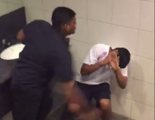 A screengrab from the video that allegedly shows an ITE College East student assaulting another in one of the school’s toilets. (PHOTO: Facebook/Soniya Raj)