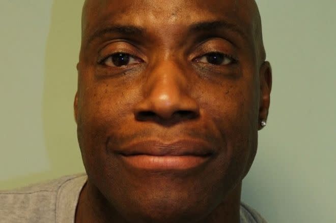 Man who strangled wife and burned body while daughters were at home jailed for life