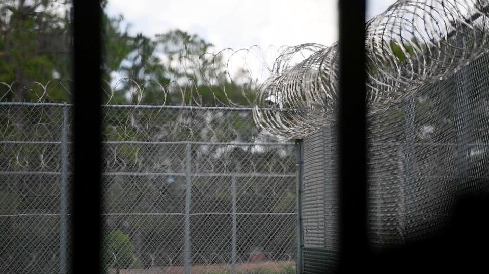 This 2017 file photo shows razor wire atop the fences at the Lowell Correctional Institution.