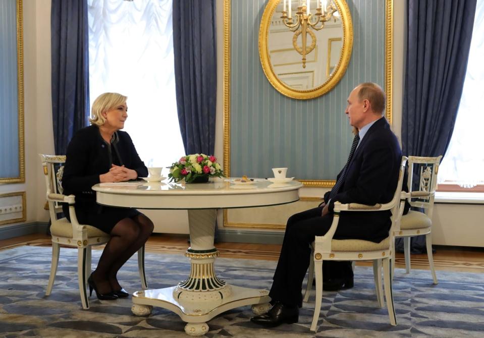 <div class="inline-image__caption"><p>President Vladimir Putin meets with French presidential election candidate for the far-right Front National party Marine Le Pen at the Kremlin in 2017.</p></div> <div class="inline-image__credit">Mikhail Klimentyev/AFP via Getty</div>