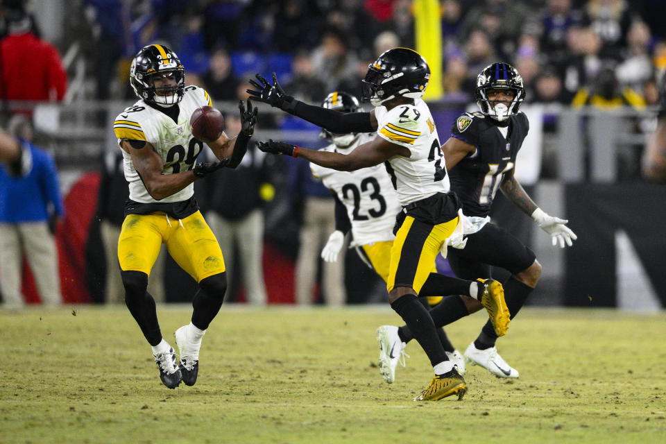 Pittsburgh Steelers safety Minkah Fitzpatrick (39) intercepts a pass against the Baltimore Ravens in the second half of an NFL football game in Baltimore, Fla., Sunday, Jan. 1, 2023. The Steelers defeated the Ravens 16-13. (AP Photo/Nick Wass)