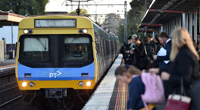 Commuters line a platform at a Melbourne station ahead of a rail strike in Septmeber, 2015. Photo: AAP
