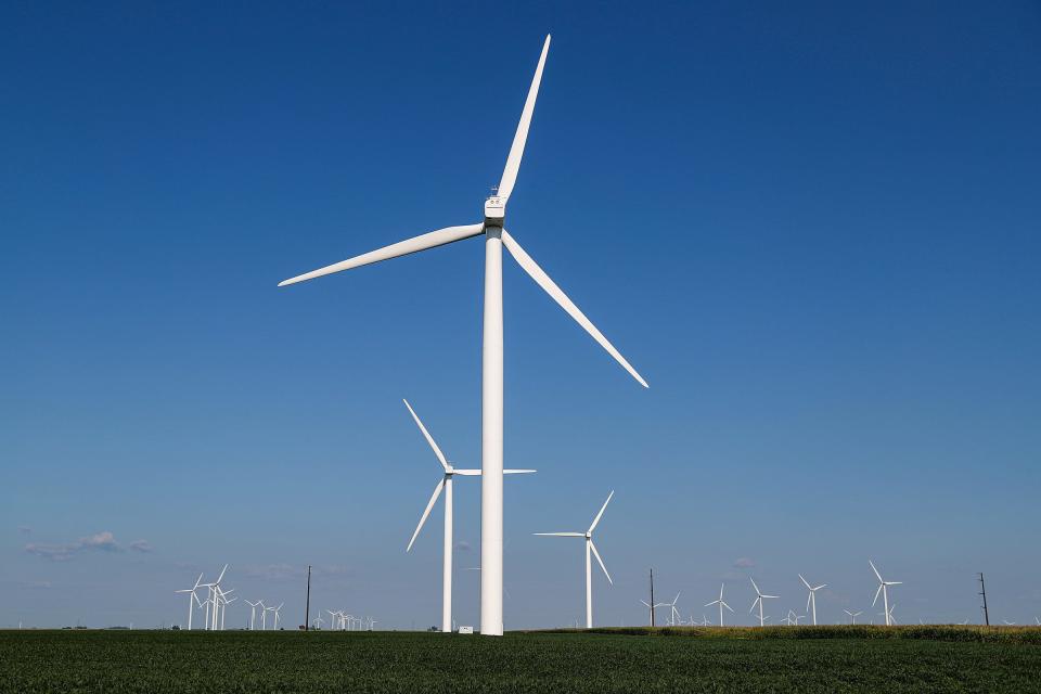 Wind turbines operate in a rural area north of Lafayette, Indiana, on Wednesday, August 4, 2021. 