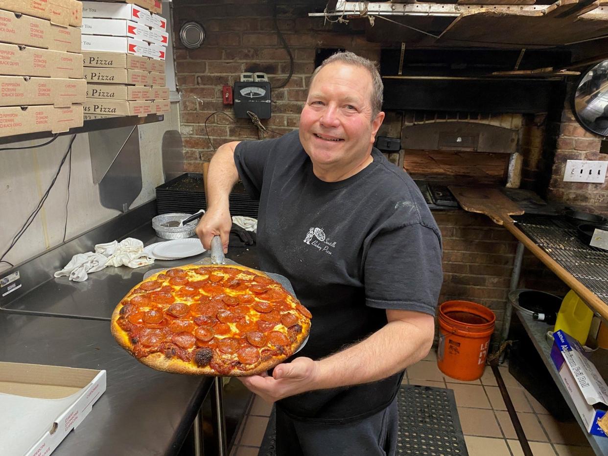 Al Santillo in a photo taken January 2023 in his Elizabeth bakery/pizzeria. Santillo's which had been operating for more than 100 years was closed after a fire broke out earlier this month. He's making pizzas this Sunday, Jan. 21, 2024 in Morristown's Coniglio's Old Fashioned.