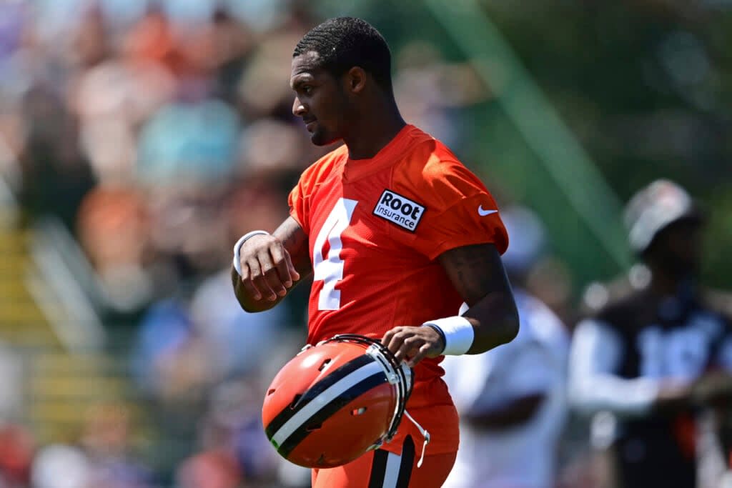 Cleveland Browns quarterback Deshaun Watson walks during an NFL football practice in Berea, Ohio, Saturday, July 30, 2022. (AP Photo/David Dermer)