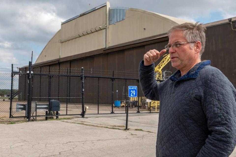 John Roper, president of the Airline History Museum, points out areas of Hangar 9 where he says Signature Flight Support failed to make repairs, leaving the museum’s aviation artifacts open to the elements.