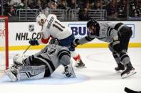 March 16, 2019; Los Angeles, CA, USA; Florida Panthers left wing Jonathan Huberdeau (11) moves in ahead of Los Angeles Kings center Anze Kopitar (11) to score a goal against goaltender Jonathan Quick (32) during the third period at Staples Center. Mandatory Credit: Gary A. Vasquez-USA TODAY Sports