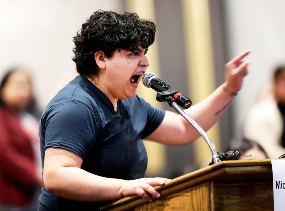 Steph Guzman, member of the Northeast Wisconsin Latino Education Task Force, speaks to the Green Bay Board of Education during a public forum on May 24, at Washington Middle School, opposing the possible closure of 11 schools in the district, citing a lack of representation and transparency with the plan called Schema 12.