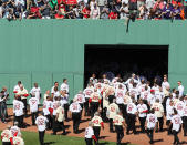 BOSTON, MA - APRIL 20: Former Boston Red Sox players, coaches and managers leave the field after a ceremony before the game between the New York Yankees and the Boston Red Sox on April 20, 2012 at Fenway Park in Boston, Massachusetts. Today marks the 100 year anniversary of the ball park's opening. (Photo by Elsa/Getty Images)