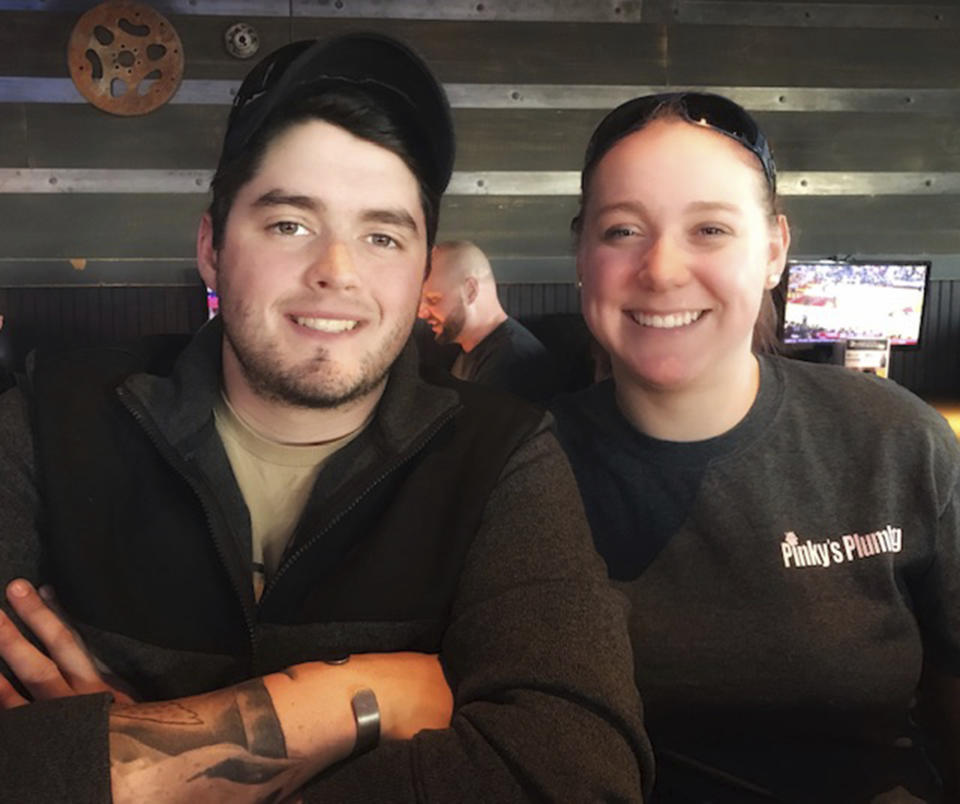 This January 2019 photo provided by Paula Kovach shows her nephew, James Johnston, and his wife, Krista, in Killeen, Texas. The two met in high school and both enjoyed the outdoors. (Paula Kovach via AP)